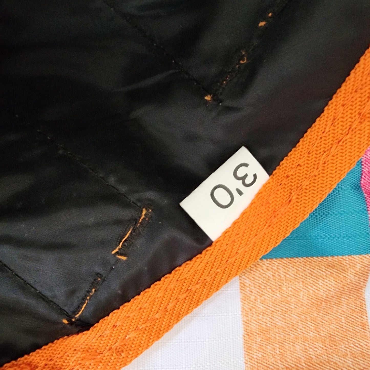 Prima check print neck rug. Brand new! 3'0"