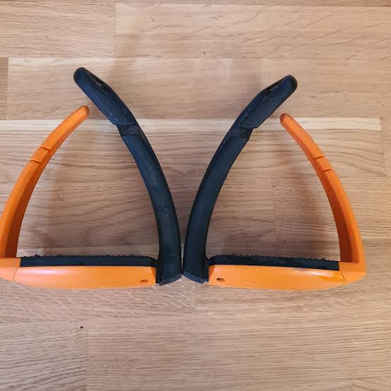 Free Jump orange and black Soft Up Pro stirrups