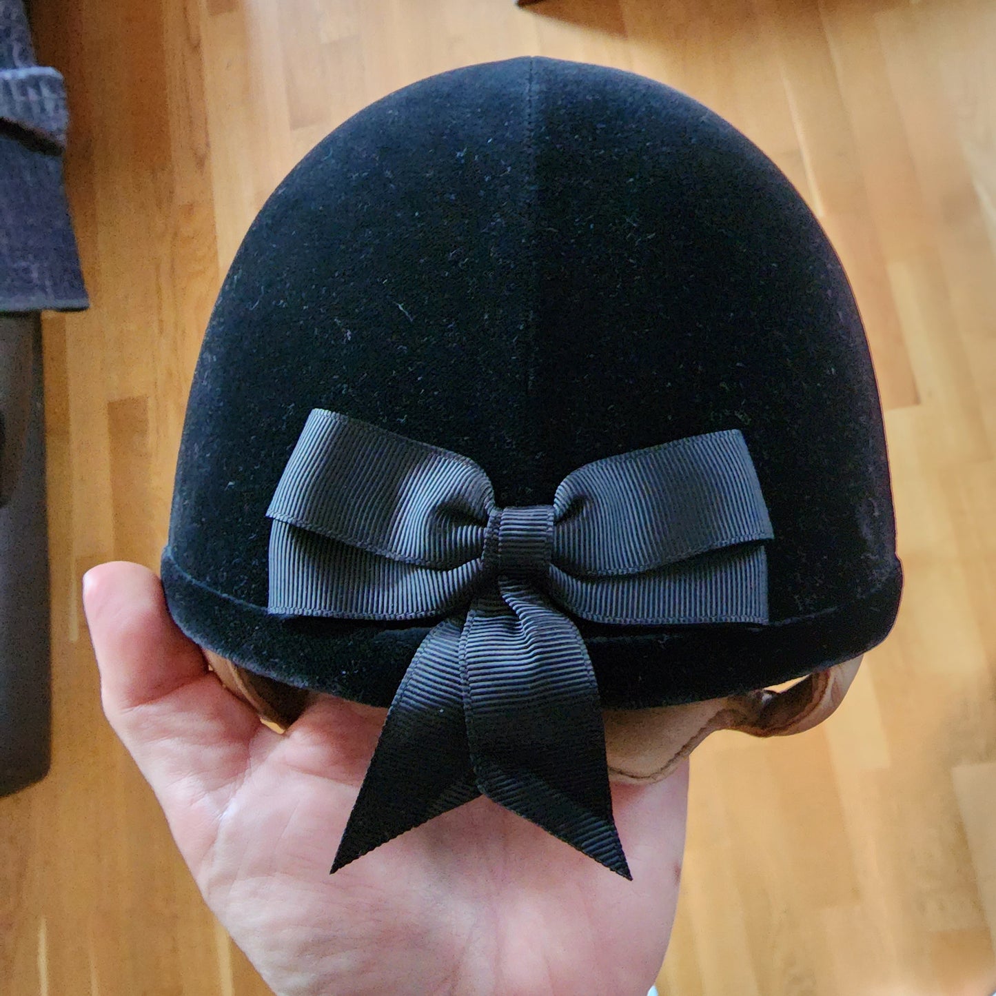 Charles Owen black velvet Fian helmet, size 60