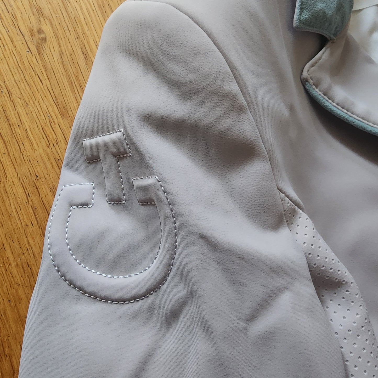 Cavalleria Toscana light grey show jacket with turquoise collar, ladies 10 (Italian 42)