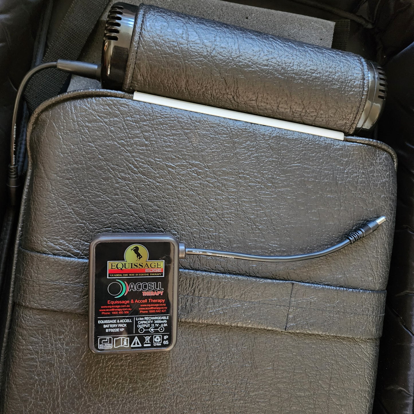 Equissage rider pad with battery