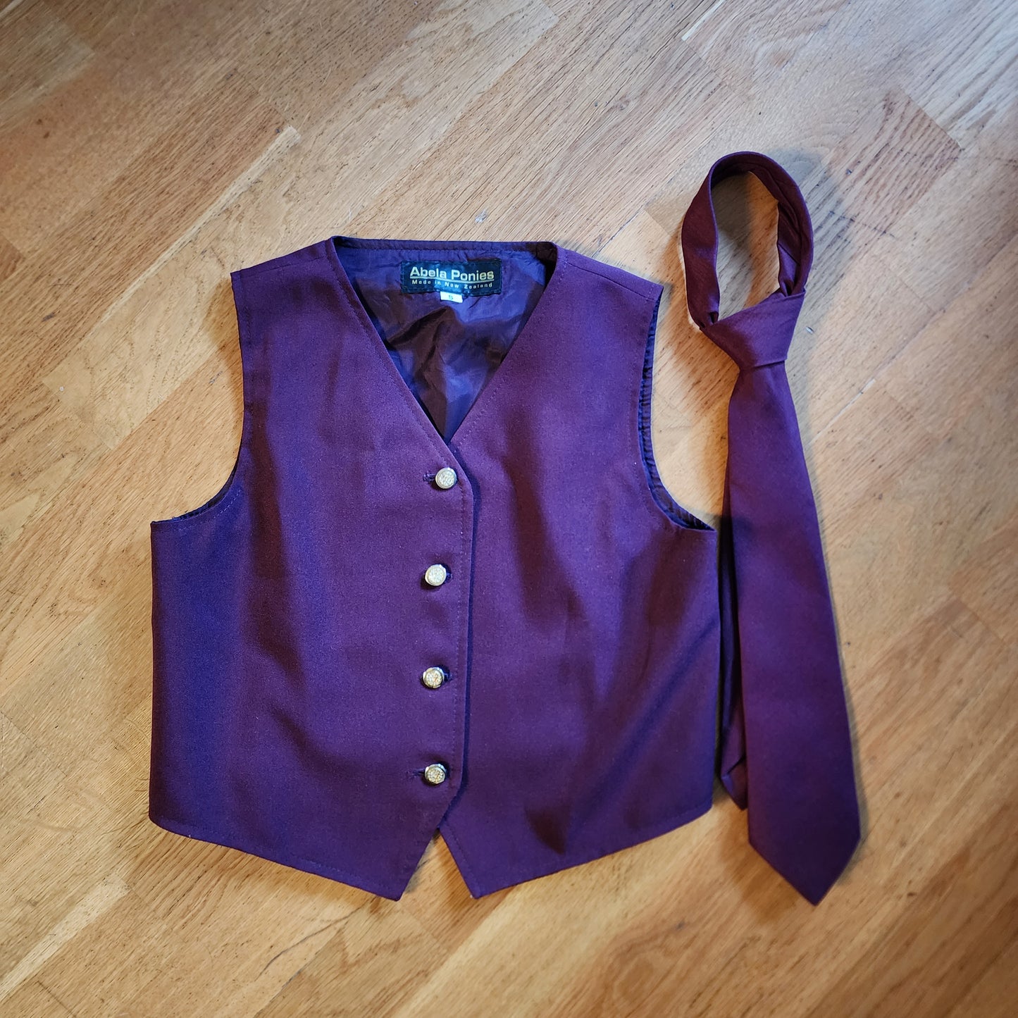 Abela Ponies burgundy Waistcoat / Vest and tie. Kids age 8 to 10