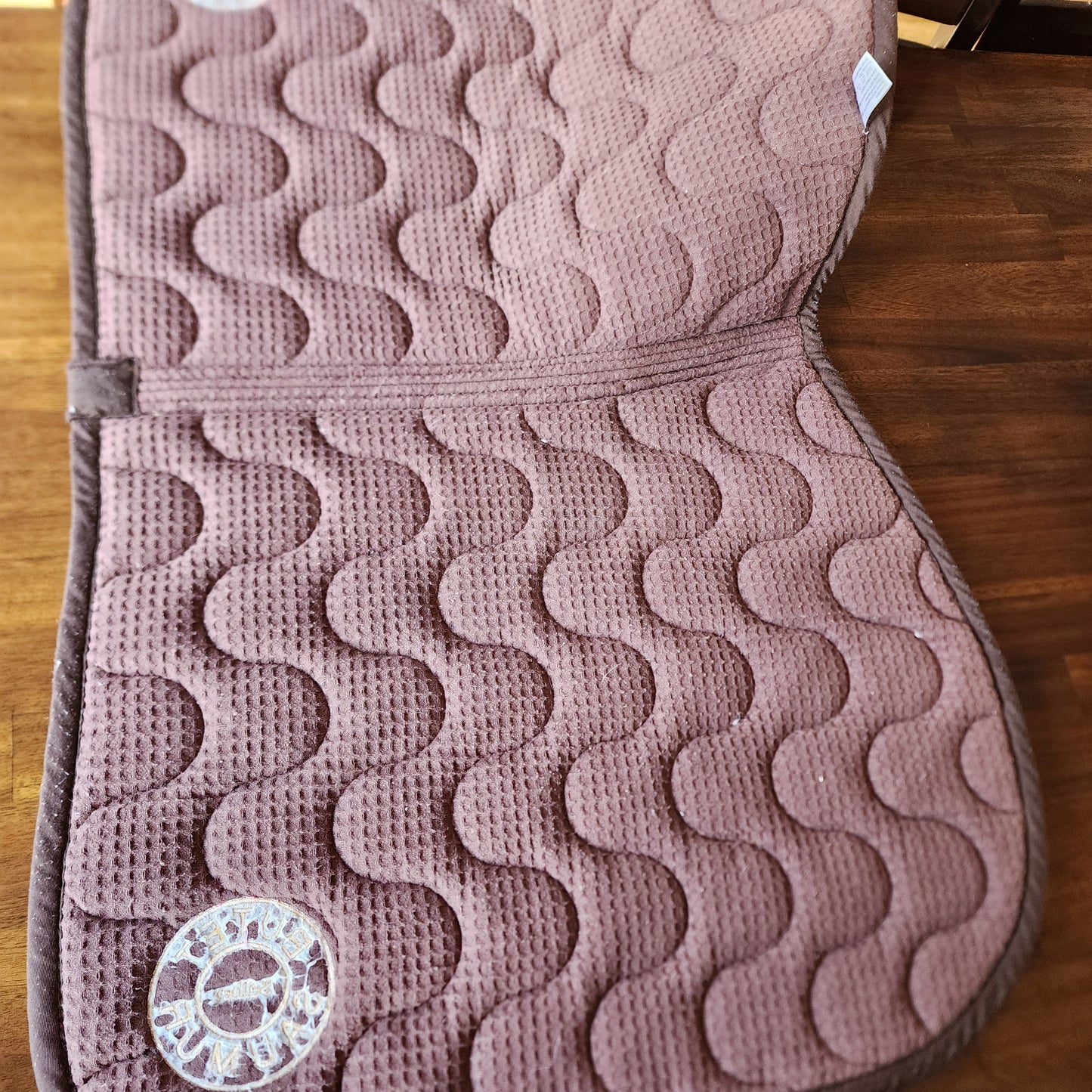 Butet brown close contact saddle pad. Pre-loved