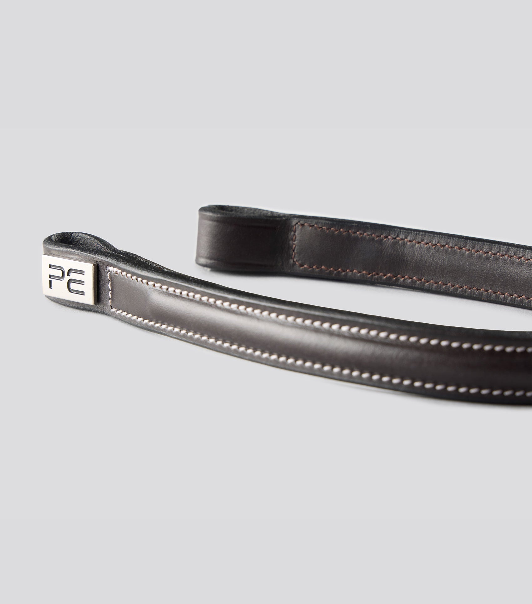 Description:Raised browband for raised jumping bridle_colour:dark havana_position:4