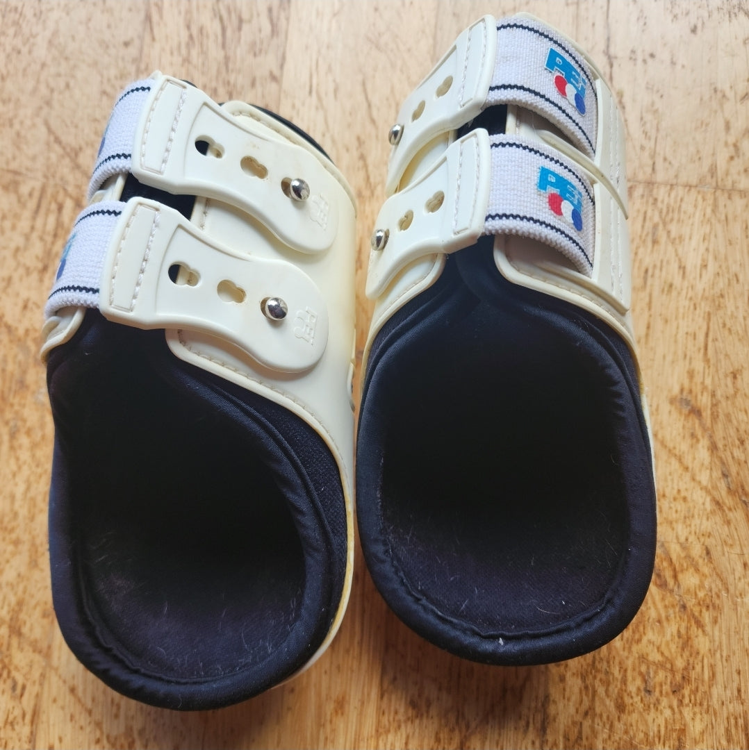 Premier Equine pre-loved white fetlock boots. Size M